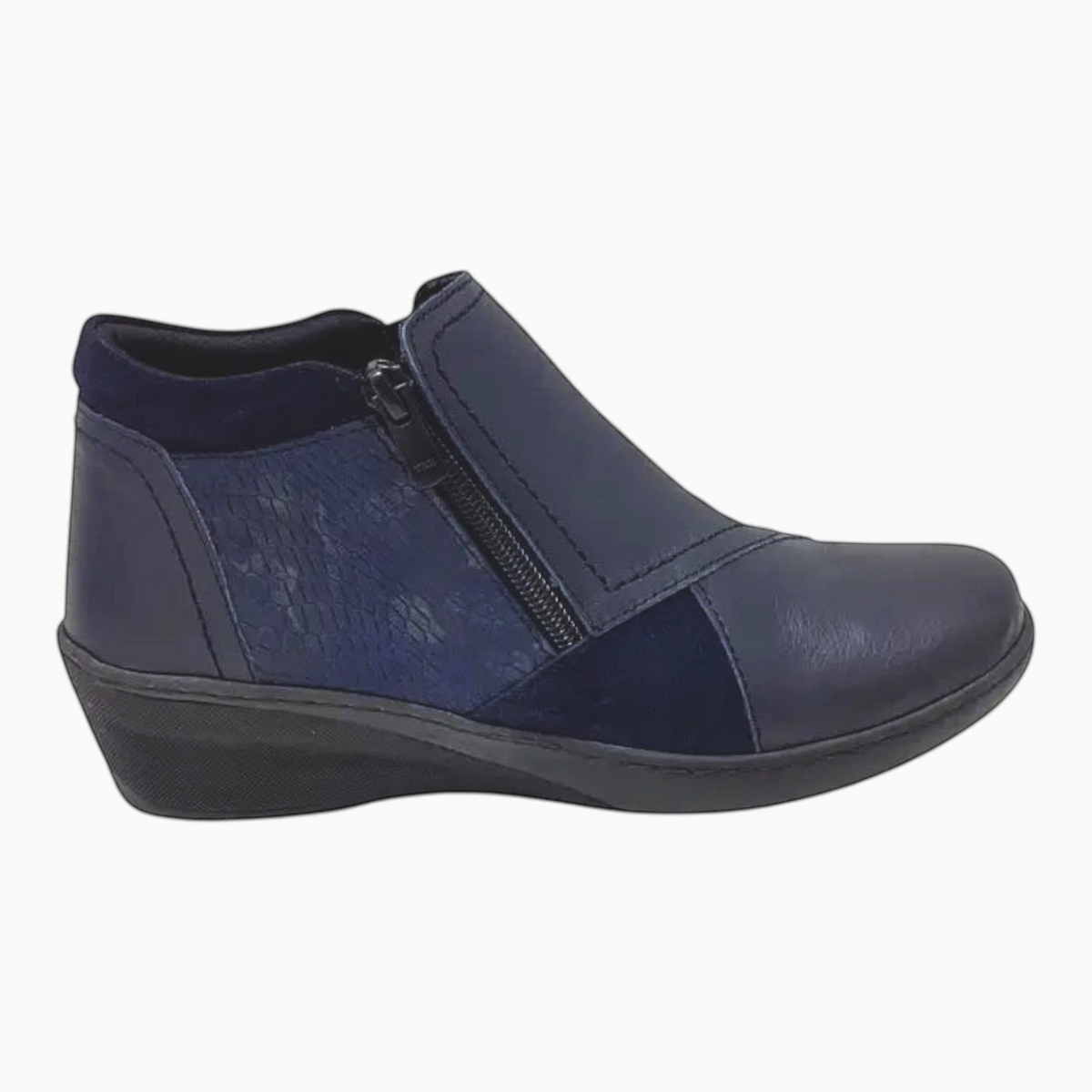The Shoe Shop navy leather wedge boot with patterned detailing, side zip, elastic gusset, and padded heel collar.