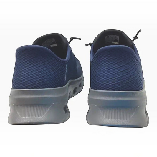 The Shoe Shop Skechers Glide Step Pro navy blue mesh sneakers showing the rear view with a flexible grey midsole.