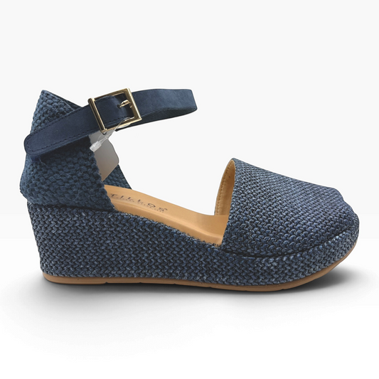 The Shoe Shop 11260 Pitillos navy blue woven wedge sandal with an adjustable ankle strap and gold buckle
