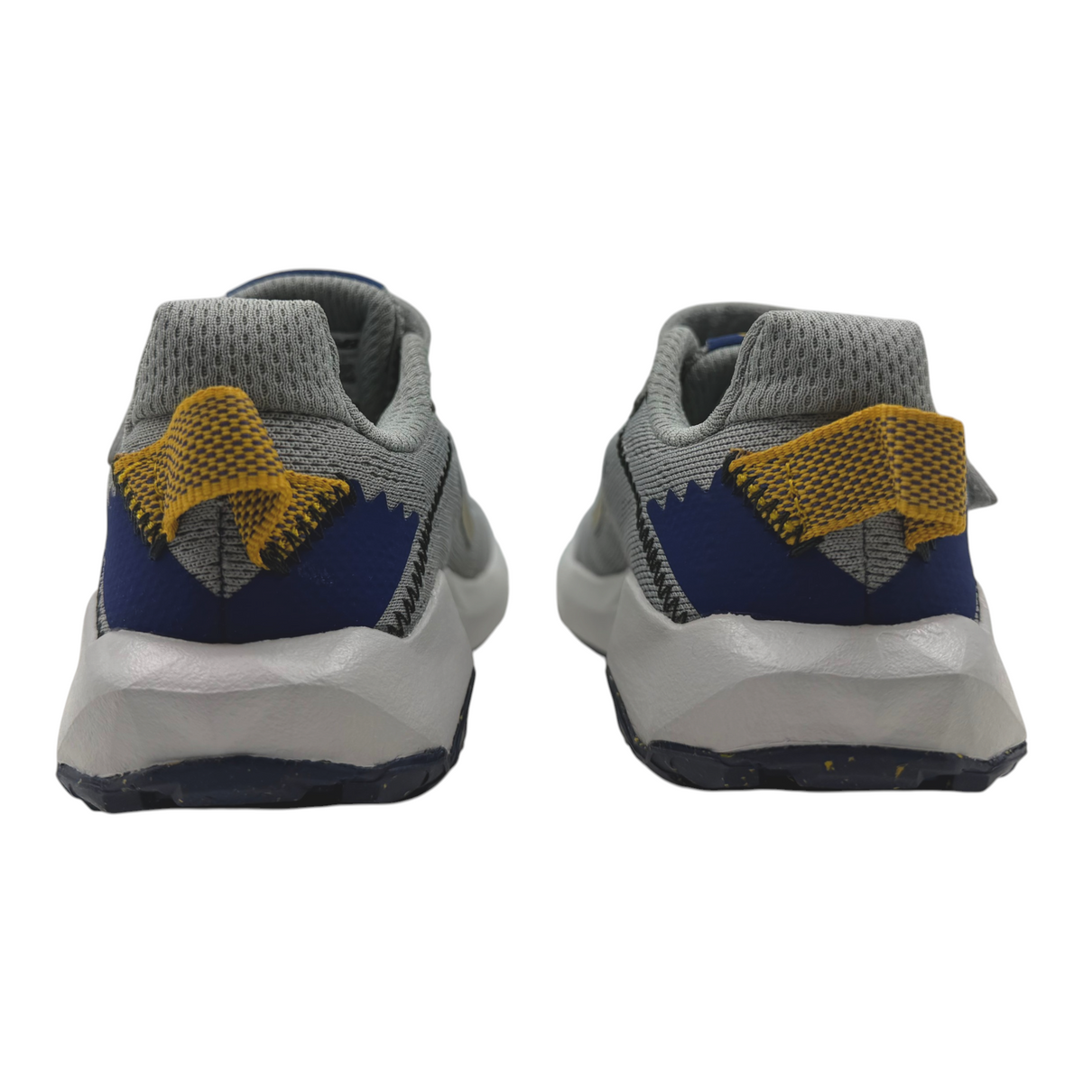 The Shoe Shop Nitrel v6 kids sneakers in grey and blue with yellow heel tabs, showing rear view of the trail shoes.