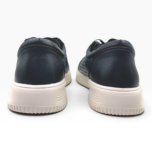 The Shoe Shop Noble black leather sneakers featuring a lightweight platform sole viewed from the back