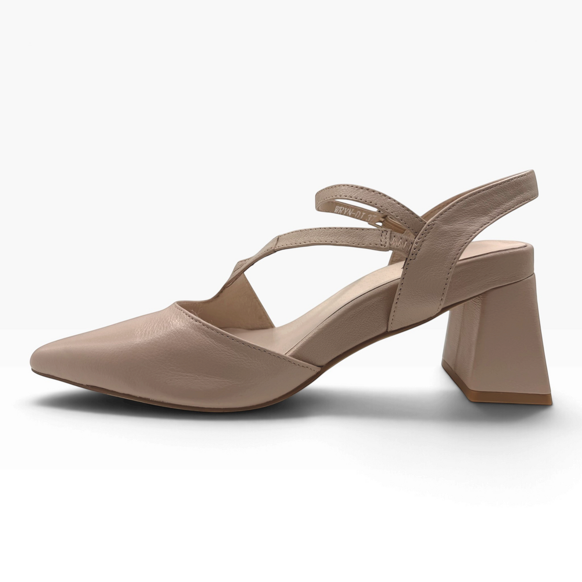 The Shoe Shop Wryn nude grained leather block heel with pointed toe, cross-strap detailing, and adjustable slingback.