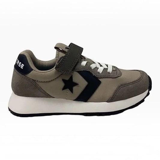 The Shoe Shop Omega Trainer 1V OX in grey suede with black star logo, white midsole, and adjustable velcro strap.
