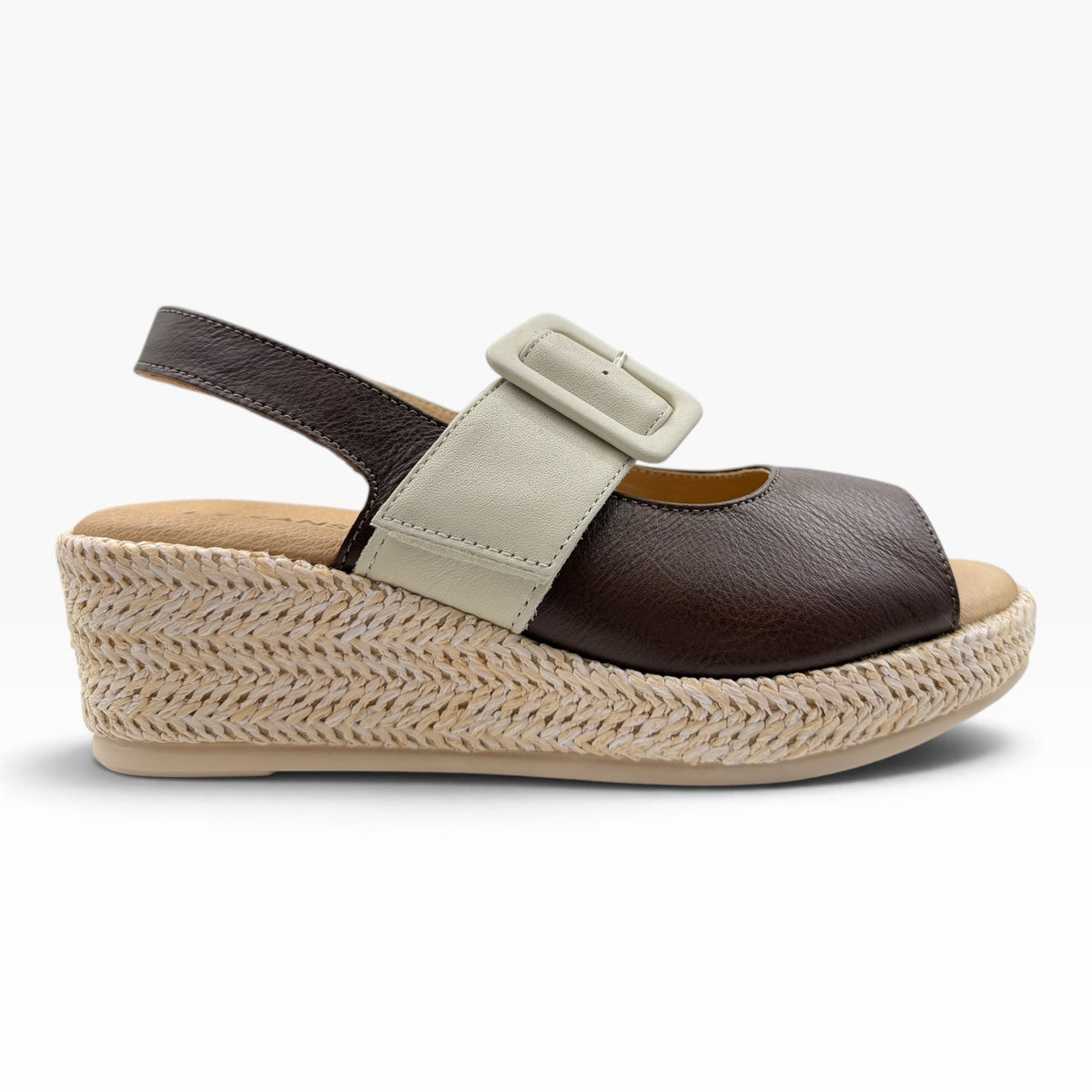 The Shoe Shop Parola two-tone leather wedge sandal with a raffia-covered sole and adjustable strap.
