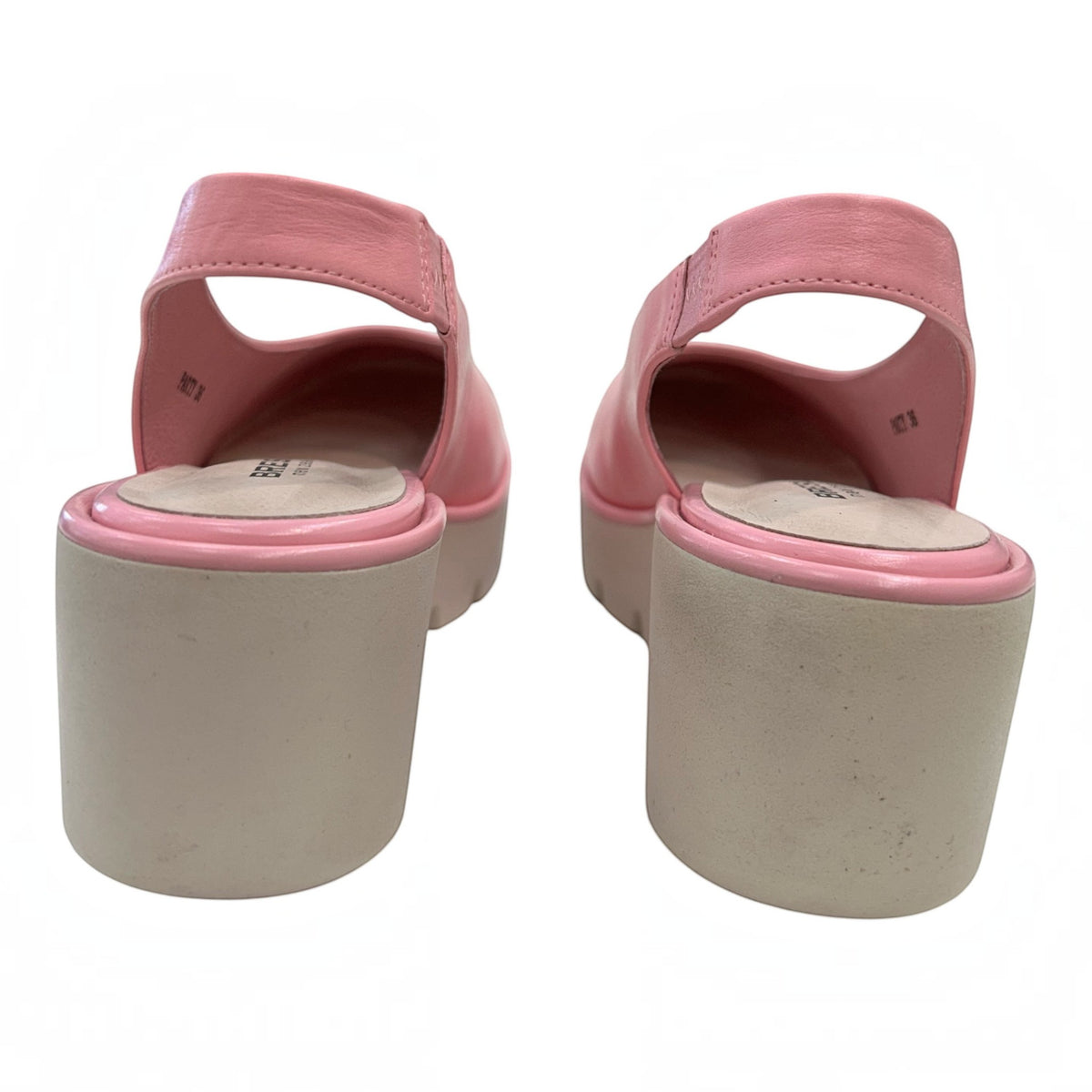 The Shoe Shop Party pink leather slingback wedge shoes with a durable rubber sole, shown from the back view.
