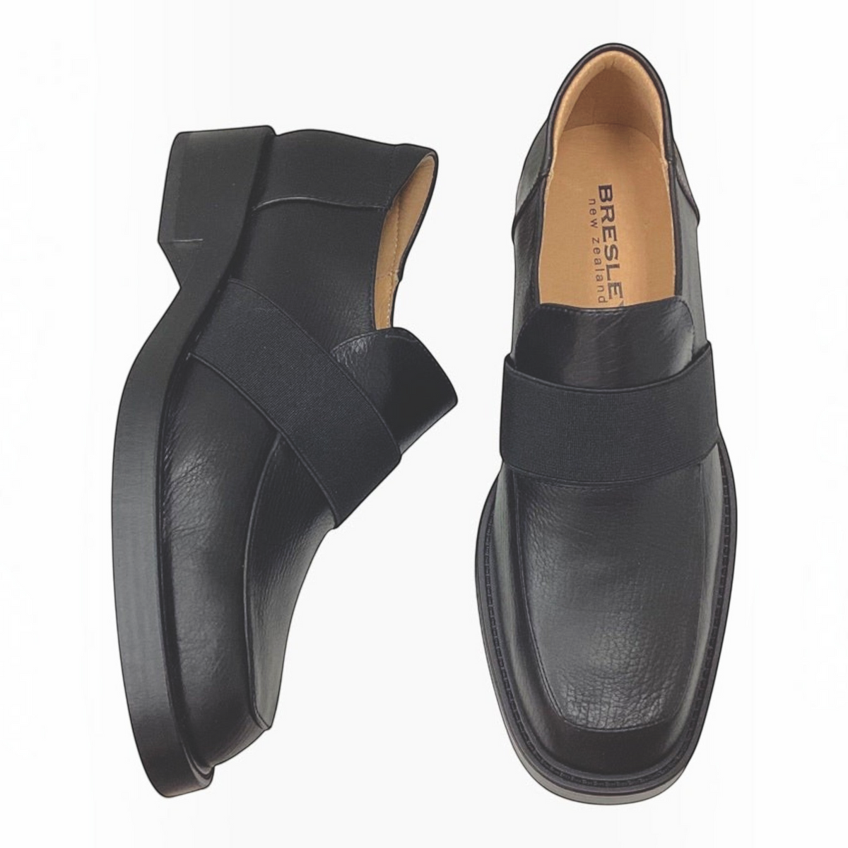 The Shoe Shop Penmark black leather loafers with a wide elastic strap and chunky sole