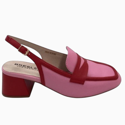 The Shoe Shop Peony slingback shoe in pink and red with a block heel, penny loafer upper, and adjustable buckle strap.