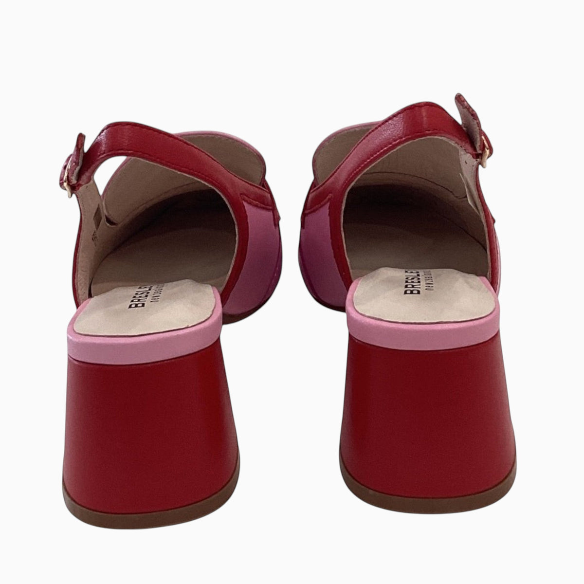 The Shoe Shop Peony slingback heels in red and pink leather with a block heel and adjustable buckle strap, rear view.