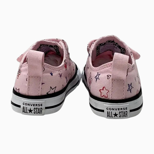 The Shoe Shop pink canvas Chuck Taylor All Stars with hand-drawn star and heart doodles and heel pull tabs