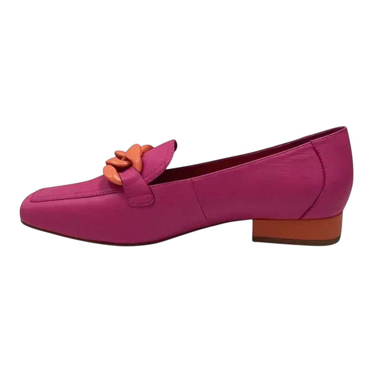 The Shoe Shop Roam Shoe in bright pink leather with a chunky orange chain detail and a low block heel