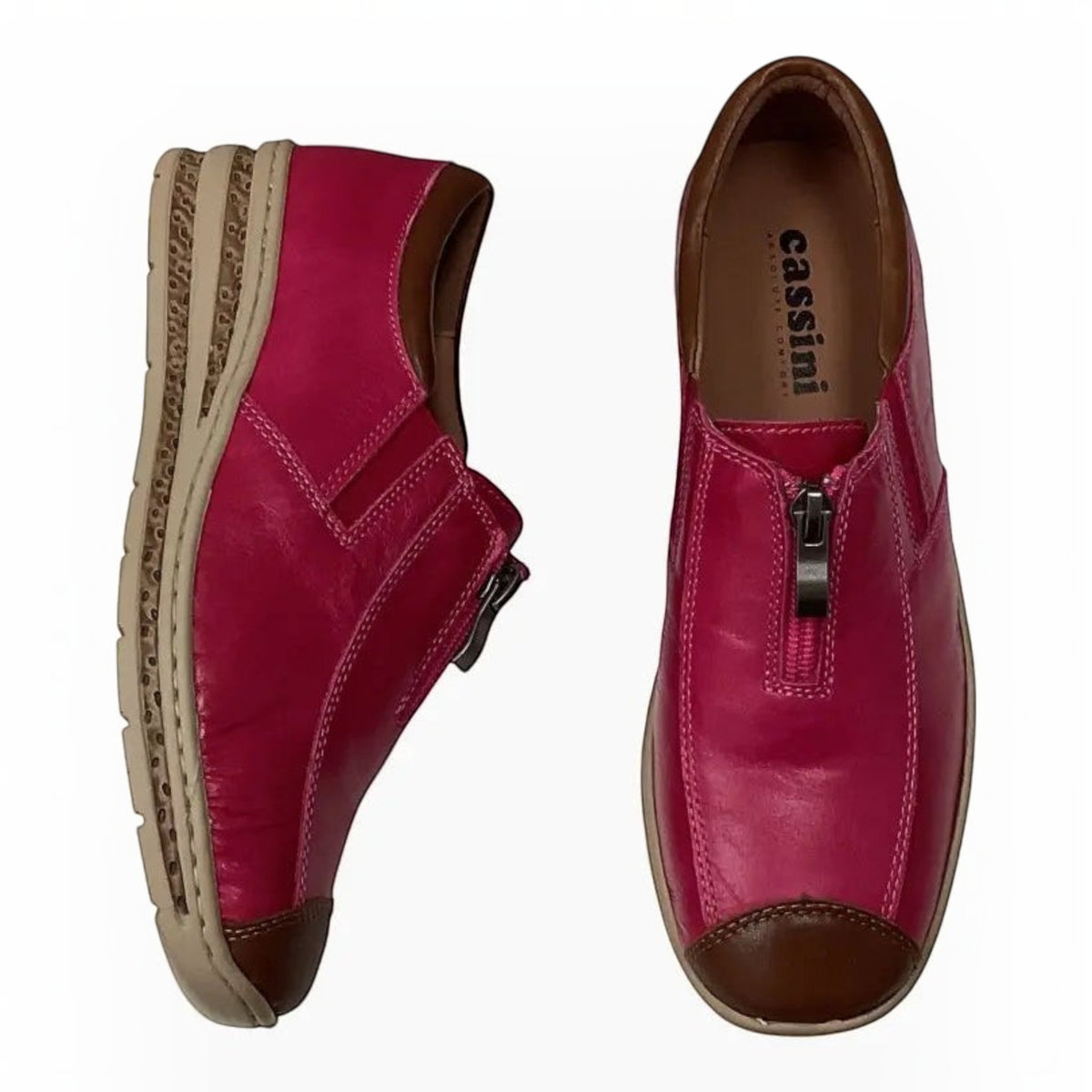 The Shoe Shop Cassini Mika pink leather shoes with front zip, brown toe cap, and comfortable low heel.