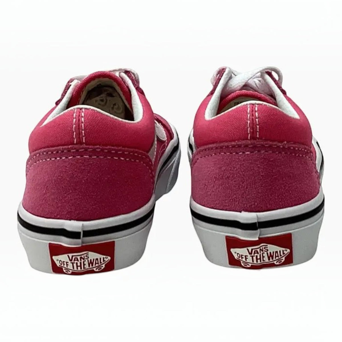 The Shoe Shop Old Skool Color Theory low-top sneakers in vibrant pink suede and canvas with signature waffle outsoles.