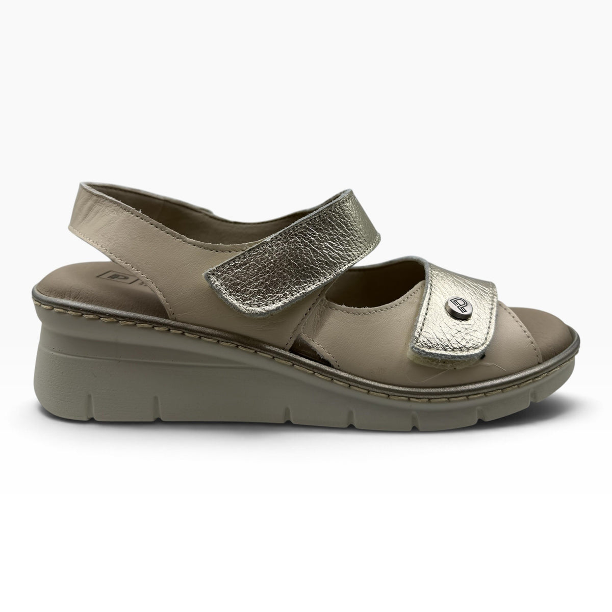 The Shoe Shop 11010 Pitillos beige leather wedge sandal with metallic silver strap and hook-and-loop closure