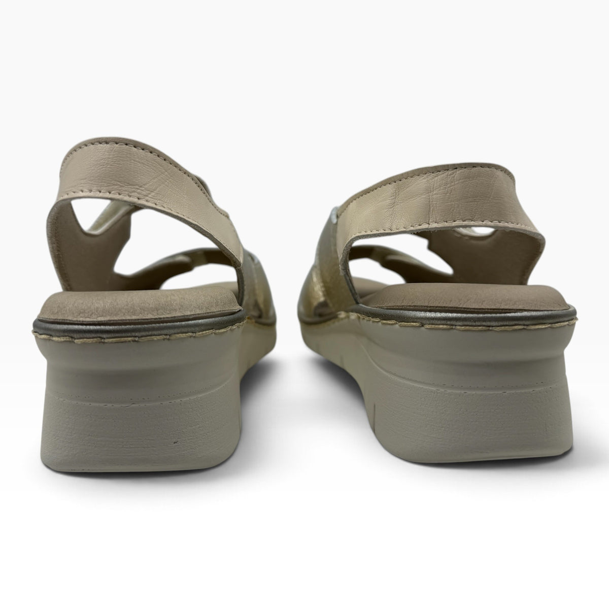 The Shoe Shop 11010 Pitillos sandals in beige leather with a comfortable wedge heel, back view.