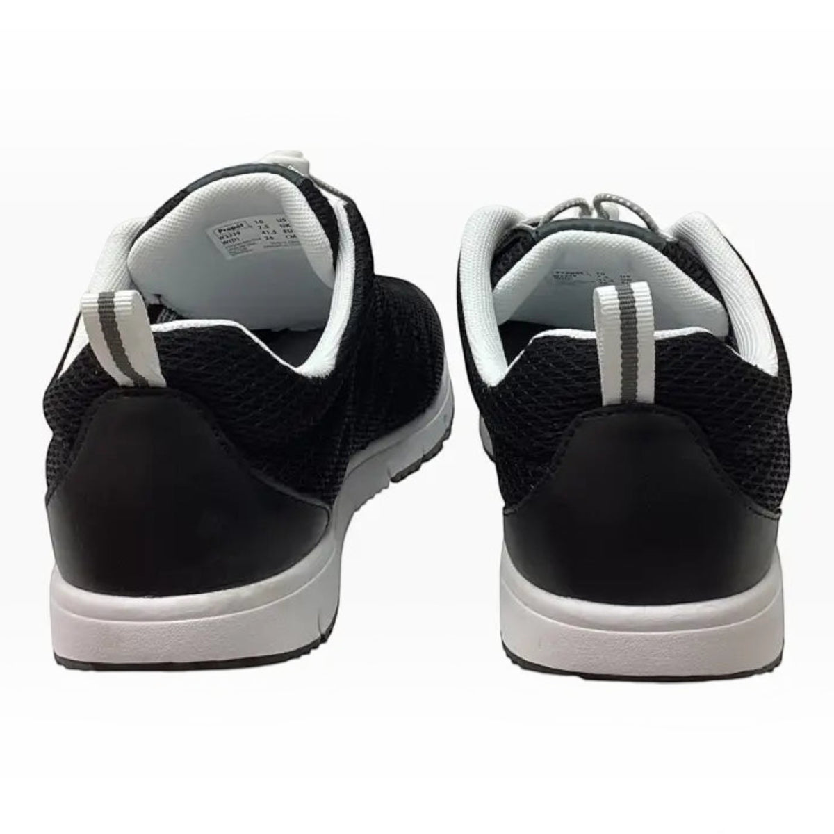 The Shoe Shop Propet Travel Walker II black mesh walking shoes showing the heel view with white cushioned collars.