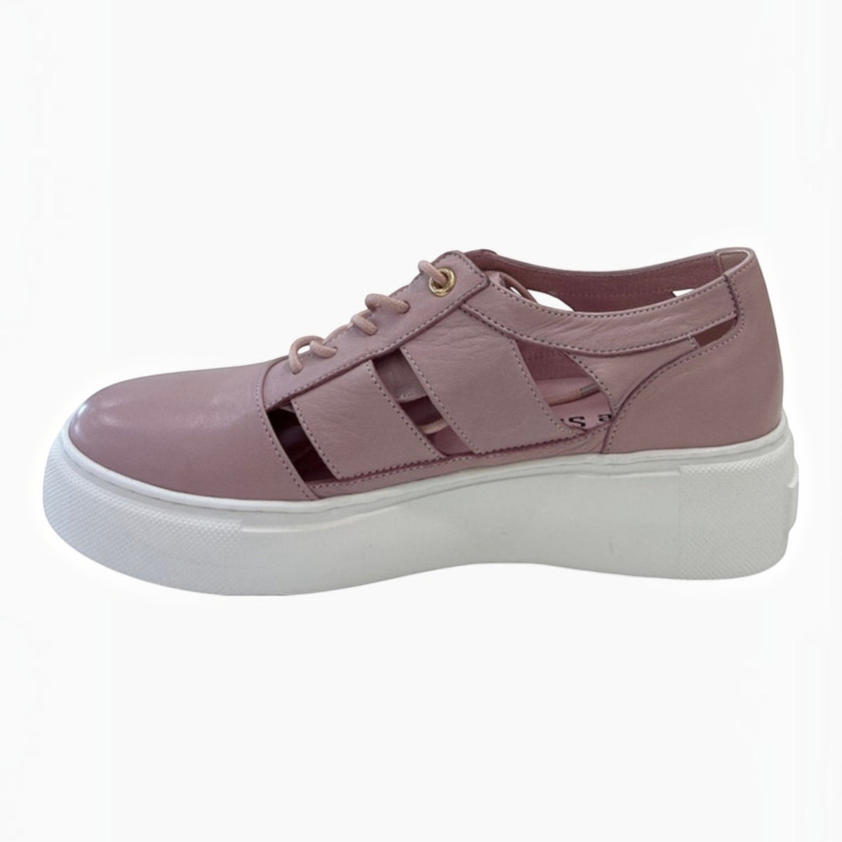 The Shoe Shop Rabid lace-up sneaker in dusty pink leather with cut-out sides and a thick white platform sole.