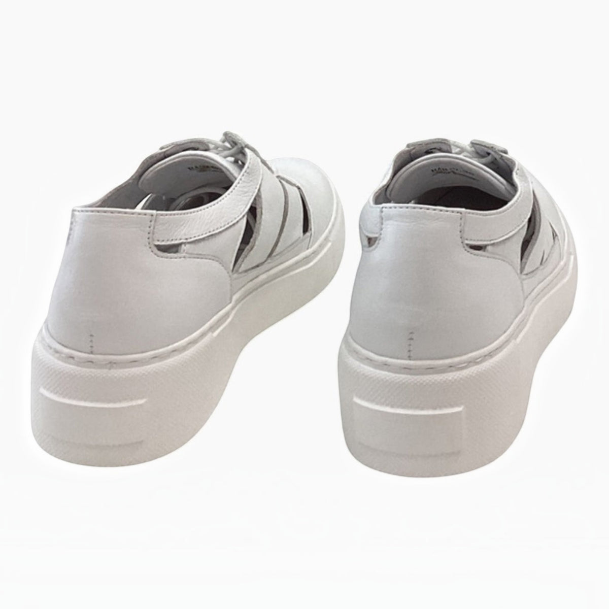 The Shoe Shop Rabid white platform sneakers with cut-out detailing and cushioned soles viewed from the back