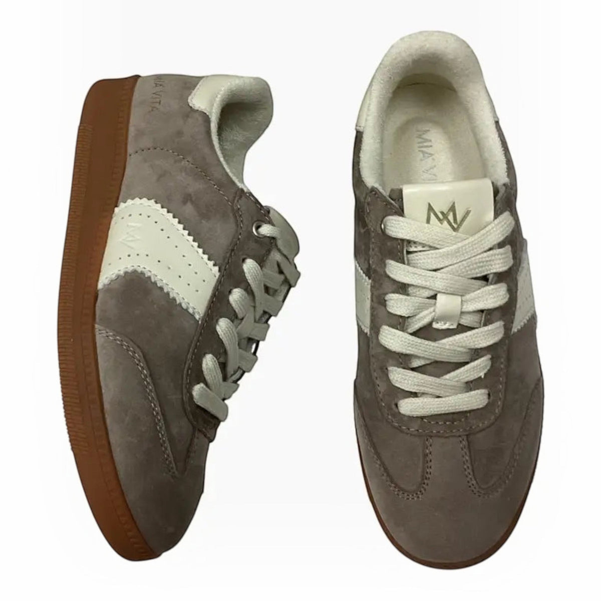 The Shoe Shop Ramona II grey suede sneakers with white lace-up front, side panel accents, and a gum rubber outsole.