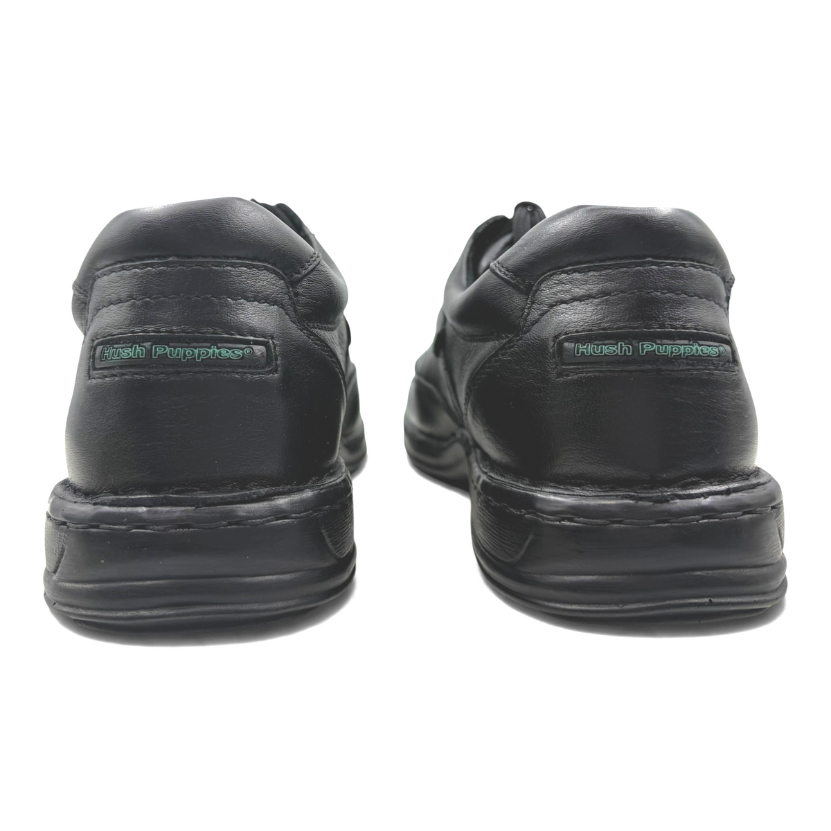 The Shoe Shop Randall II black leather walking shoes showing the cushioned heel and Hush Puppies branding from behind.