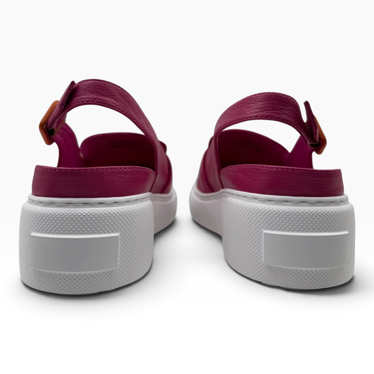 The Shoe Shop Raynell slingback loafers in magenta leather with a chunky white platform sole and adjustable strap.