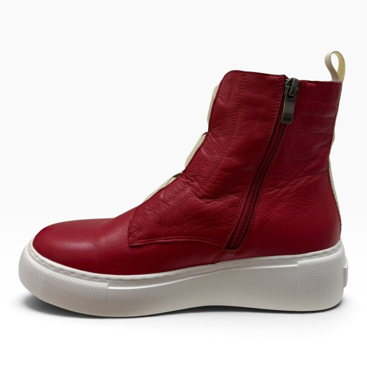 The Shoe Shop Robyn red leather ankle boot with side zipper, fluffy lining, and thick white platform sole.