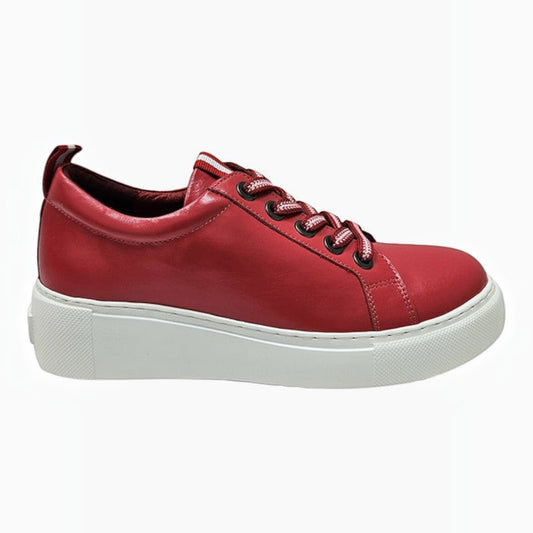 The Shoe Shop Belle Scarpe Romney red leather sneaker with white platform sole, striped laces, and oversized eyelets.