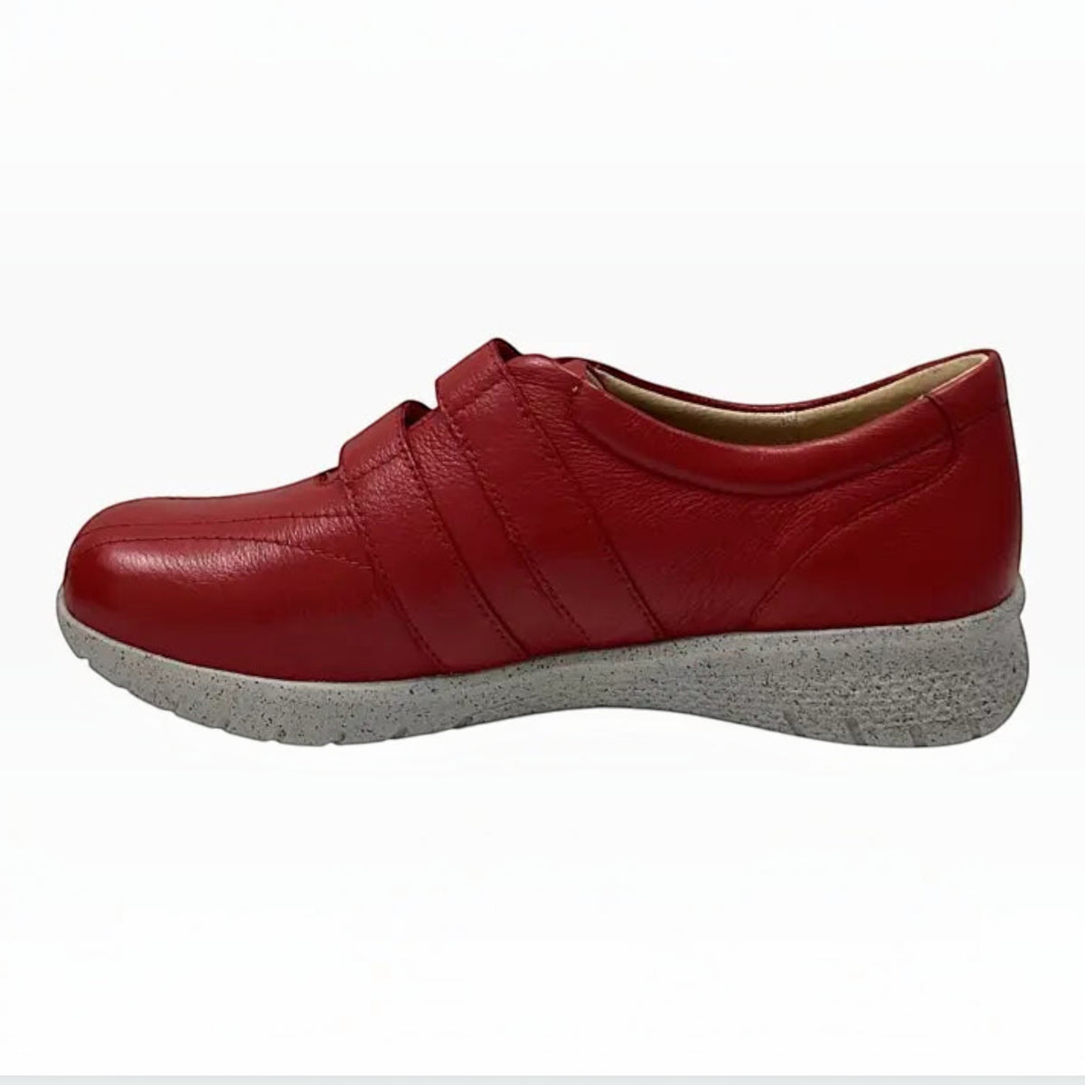 The Shoe Shop Sonnye sneaker in red leather with a comfortable grey speckled sole and hook and loop closure