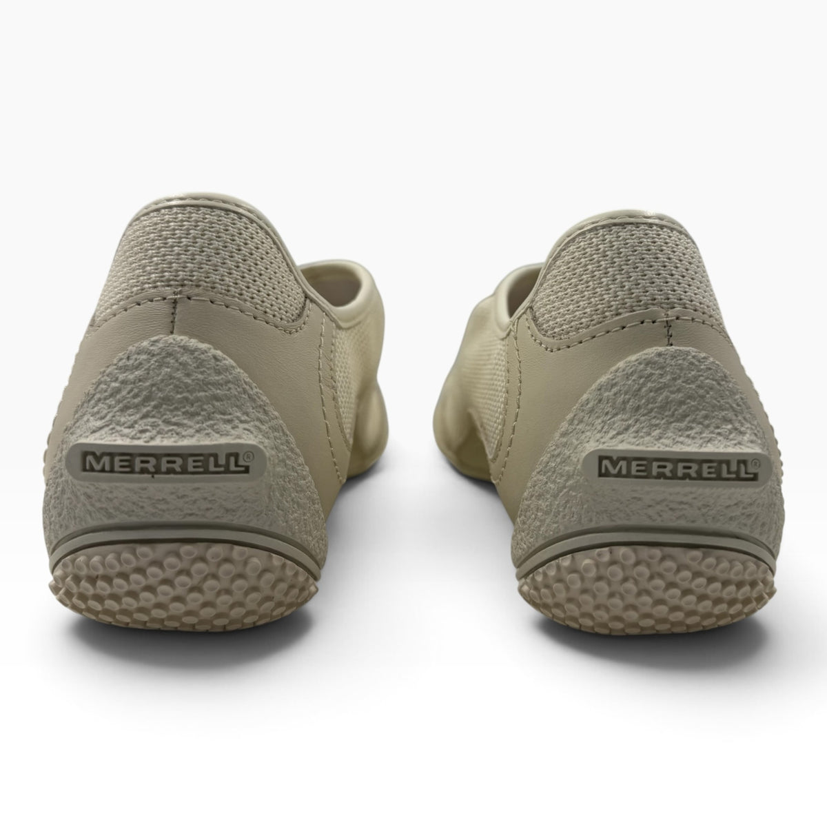 The Shoe Shop Relay Fly Zip sneakers in stucco beige, showing the textured heel and Merrell branding from the back.