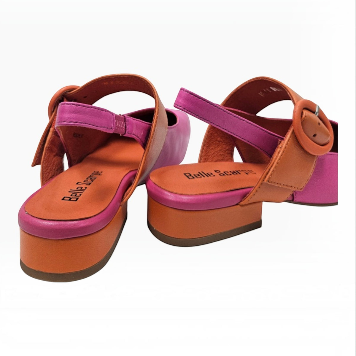 The Shoe Shop Rescue slingback shoes featuring a vibrant pink and orange colour block design with a large buckle.