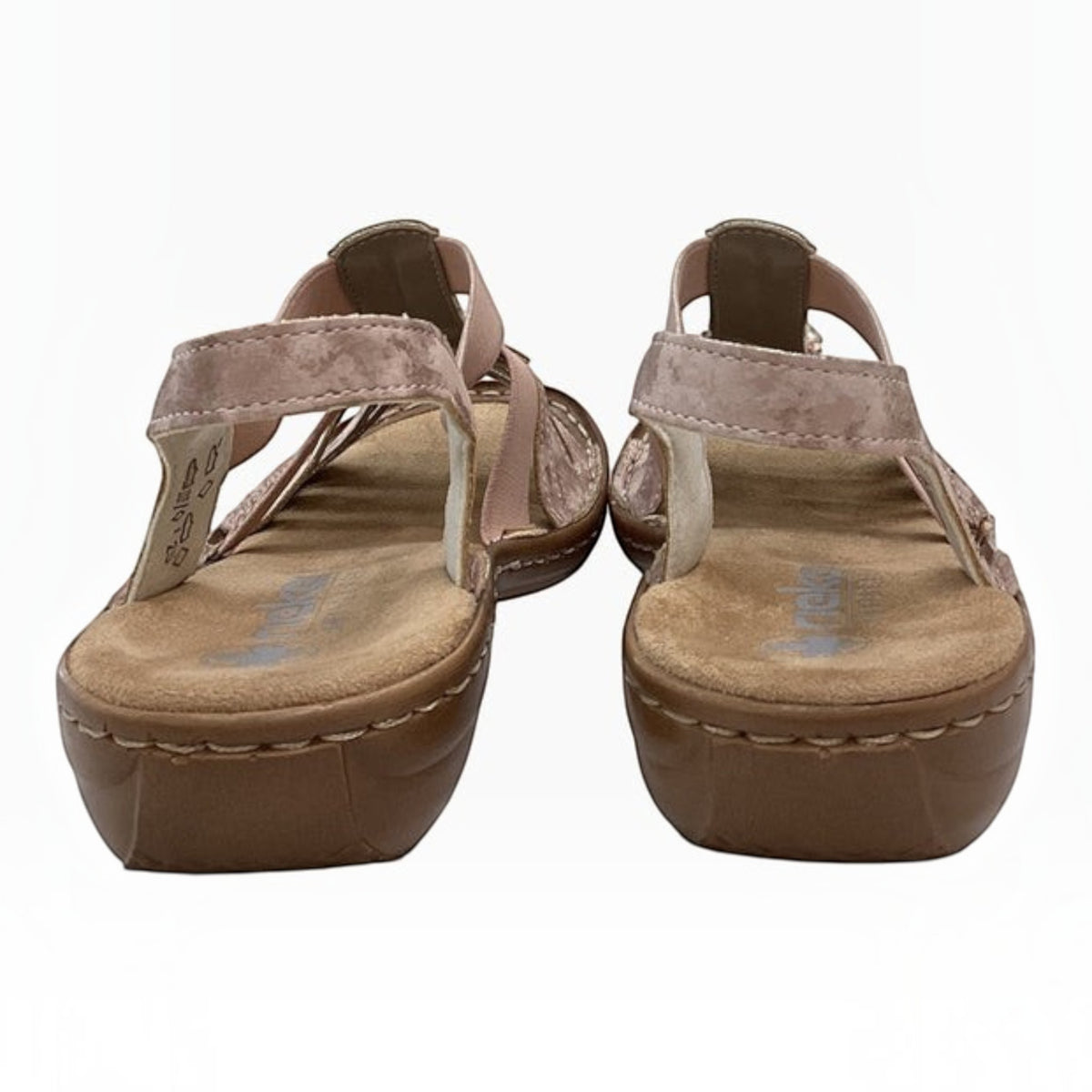 The Shoe Shop Rieker 60855-31 blush pink leather and textile sandals with cushioned footbeds and low wedge heels.