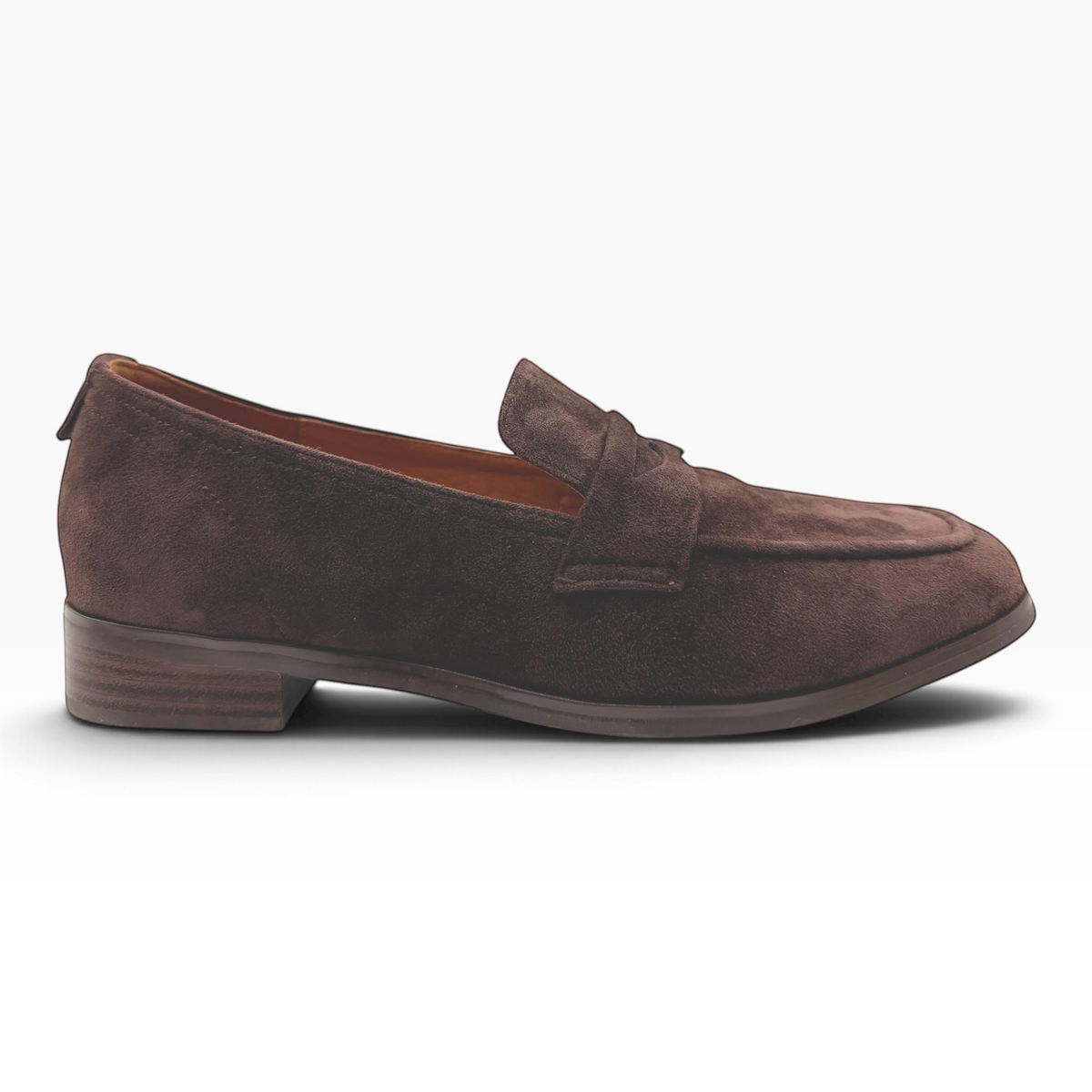 The Shoe Shop Rika Loafer in dark brown suede with a classic silhouette, low stacked heel, and stitched detailing.