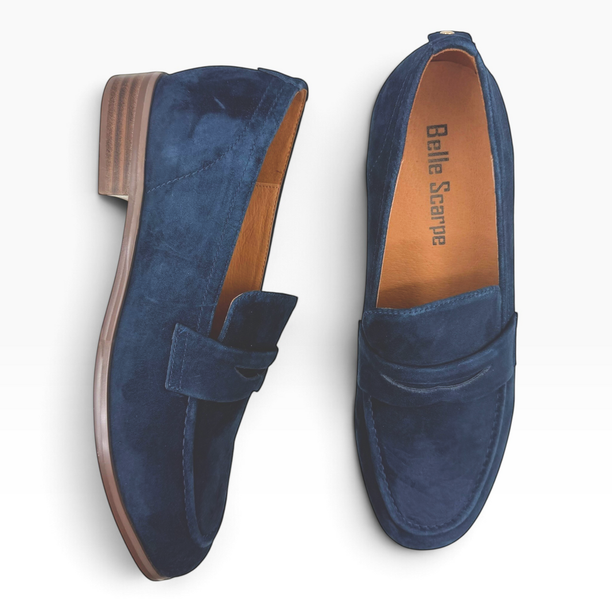 The Shoe Shop Rika navy blue suede loafers with a classic silhouette, low stacked heel, and leather-lined interior.