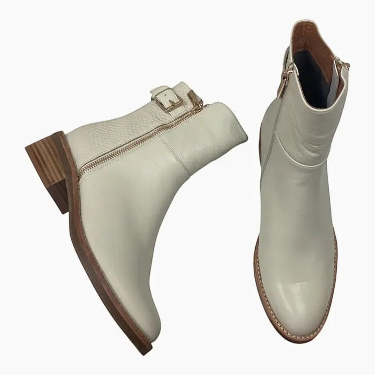 The Shoe Shop Ripper ankle boots in off-white leather with double zips, back strap, and low stacked heel.