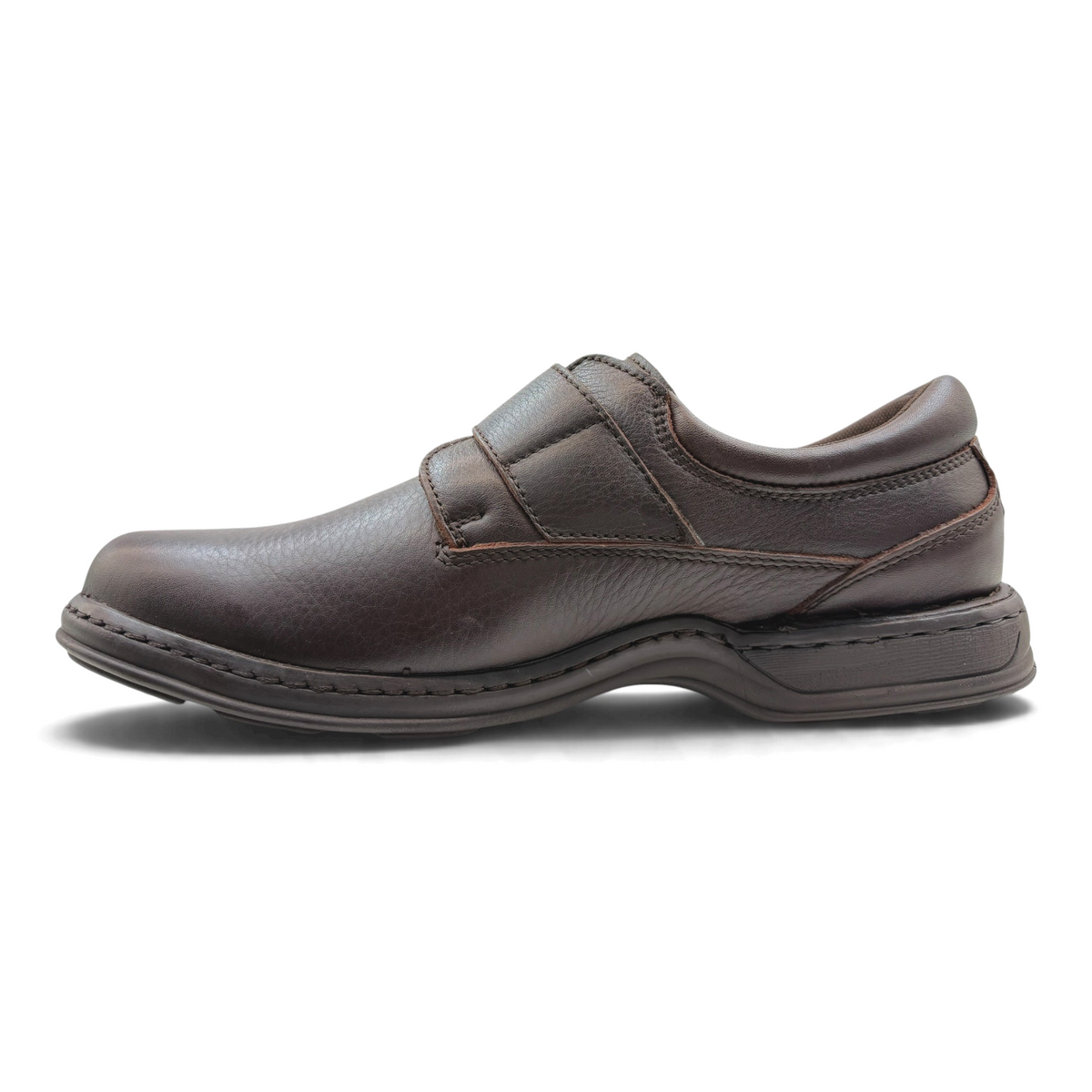 The Shoe Shop Roland leather walking shoe in dark brown with a wide fit, velcro strap, and shock-absorbing sole.