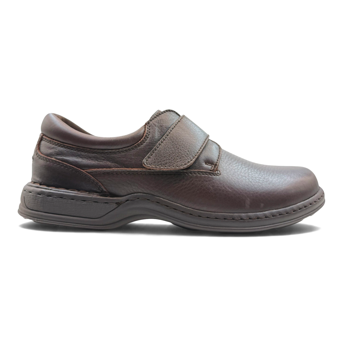 The Shoe Shop Roland brown leather walking shoe with a wide fit, velcro strap, and cushioned shock-absorbing sole.