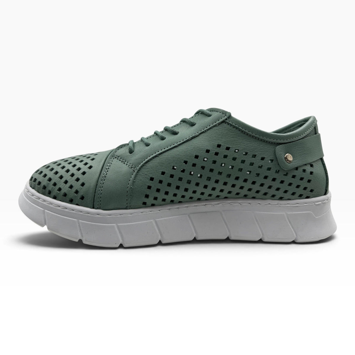 The Shoe Shop EG172 sage green punched leather sneaker with white rubber sole, laces, and side zip detail.