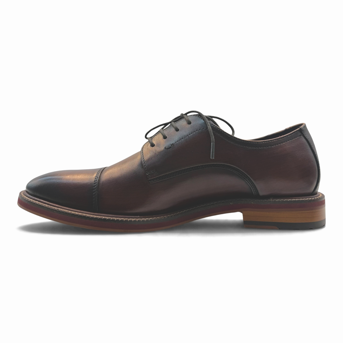 The Shoe Shop Scribble brown leather lace-up dress shoe with a toe cap and stacked sole, side profile view.