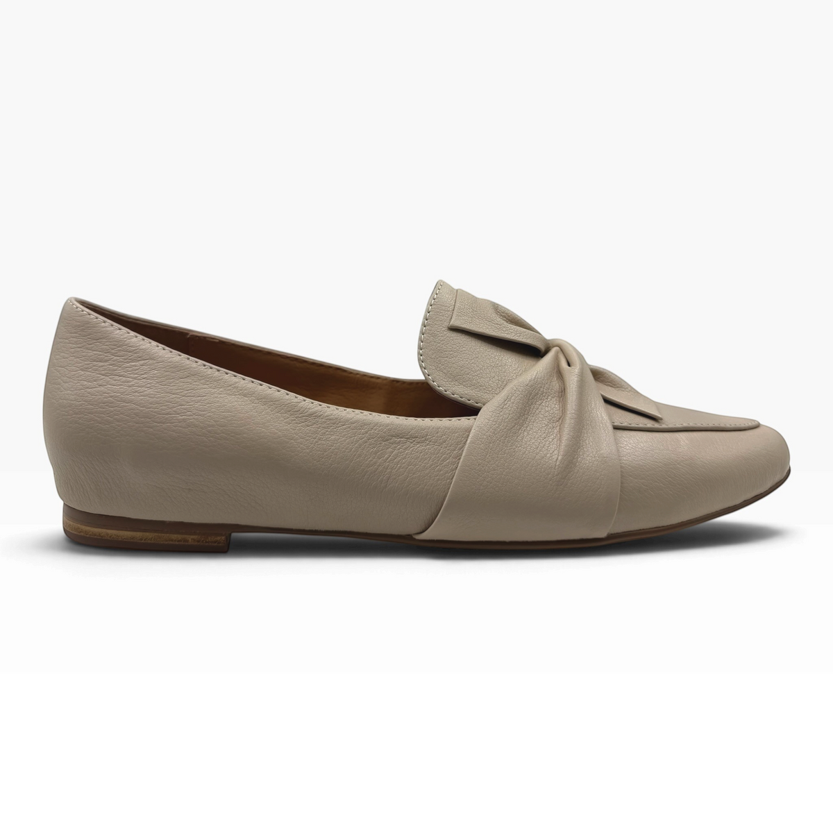 The Shoe Shop Sedone beige leather flat loafer with a soft knotted detail on the front, side view.