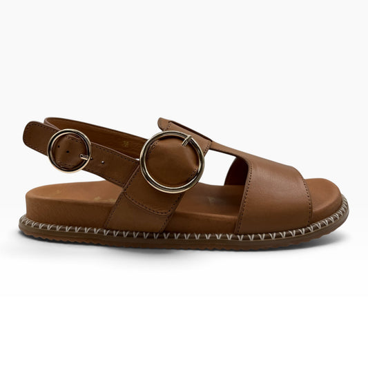 The Shoe Shop Serene tan leather flat sandals with gold buckle straps and stitched espadrille-style sole