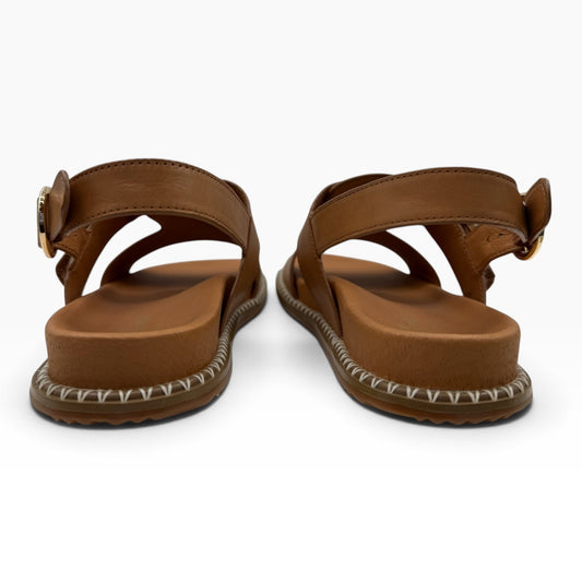 The Shoe Shop Serene tan leather sandals with a buckled ankle strap and decorative whipstitch detail on the sole