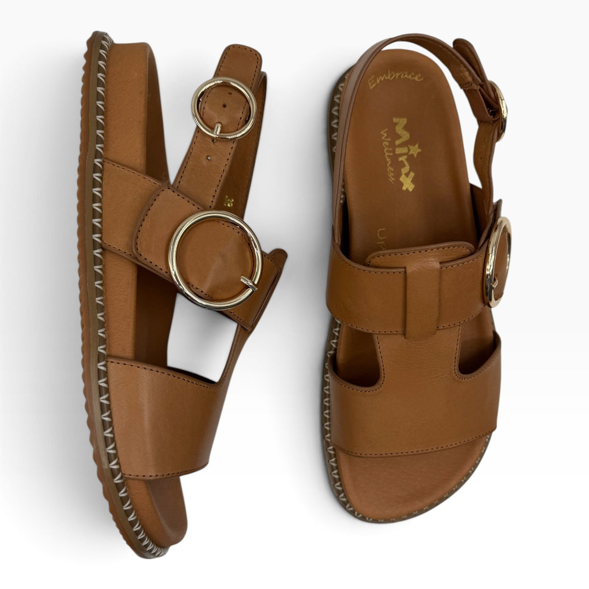 The Shoe Shop Serene tan leather sandals with gold buckle details and stitched platform soles