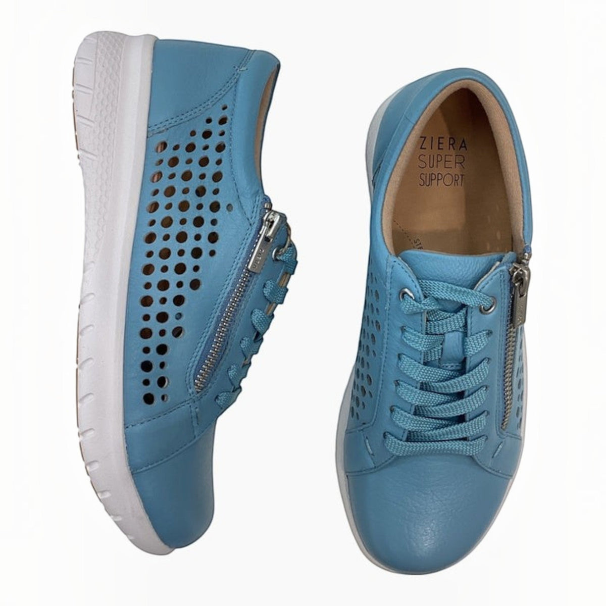 The Shoe Shop Shovo orthotic-friendly blue leather sneakers with perforated sides, side zipper, and white sole.