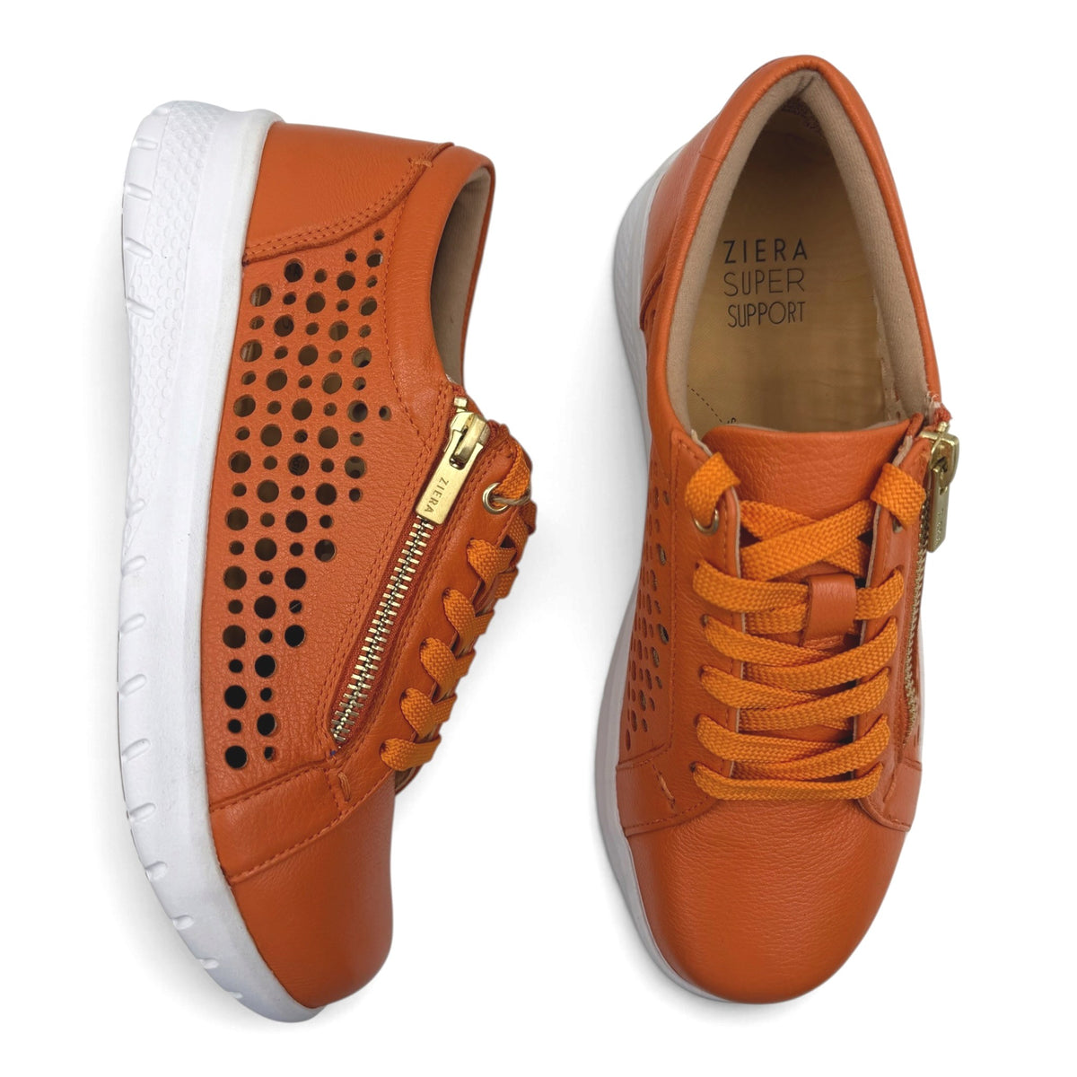 The Shoe Shop Shovo extra wide leather sneakers in burnt orange with side zip, lace-up closure, and perforated detail.