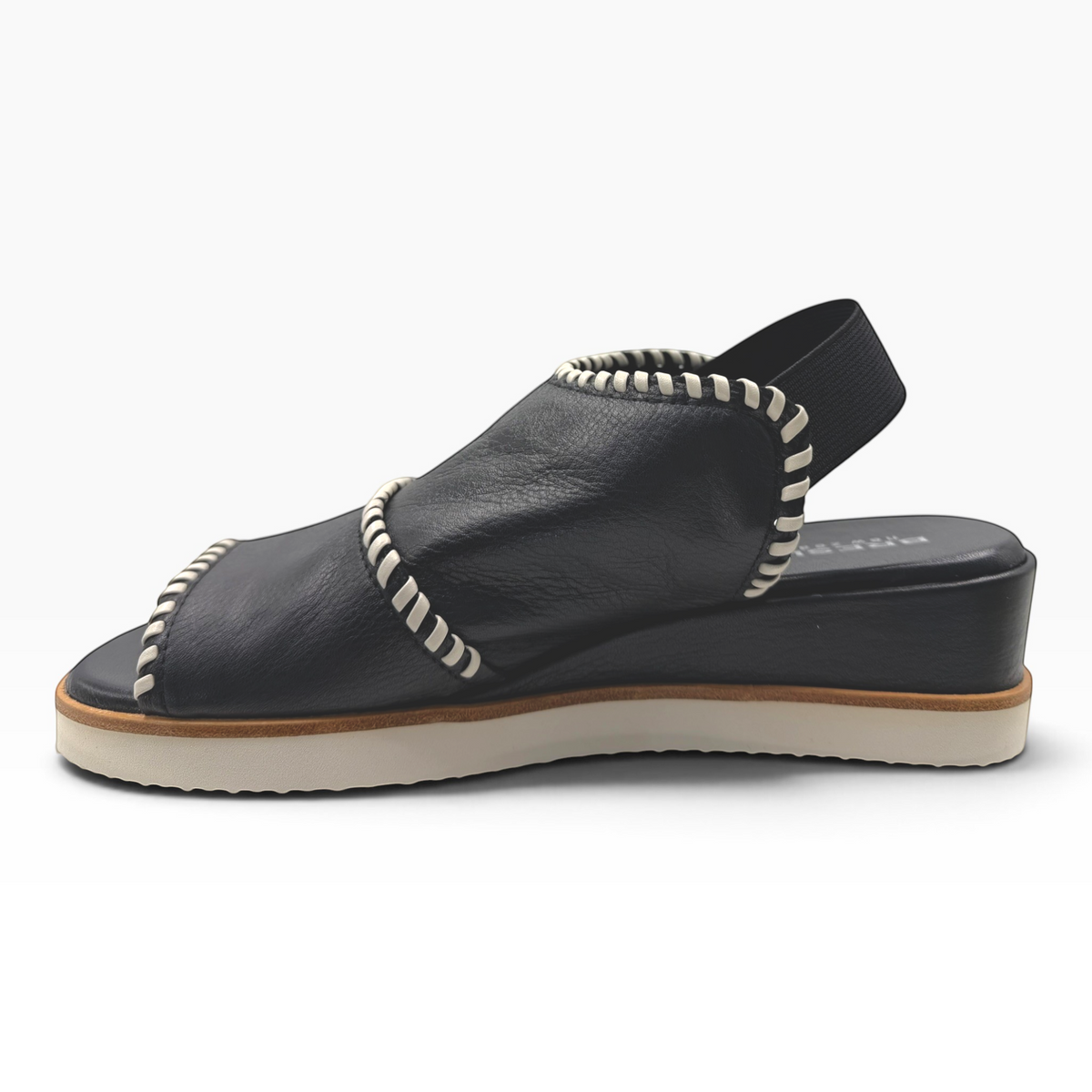 The Shoe Shop Sigma black leather wedge sandal with contrast white whipstitch detailing and elasticated slingback.