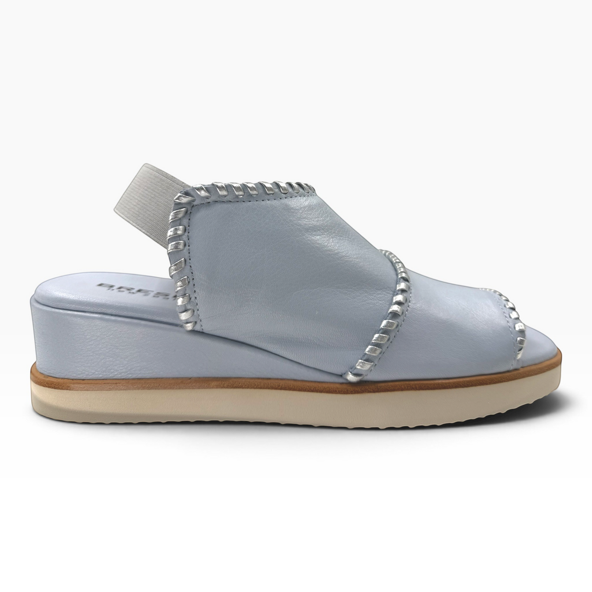 The Shoe Shop Sigma light blue leather wedge sandal with contrast silver whipstitch detail and elastic slingback strap