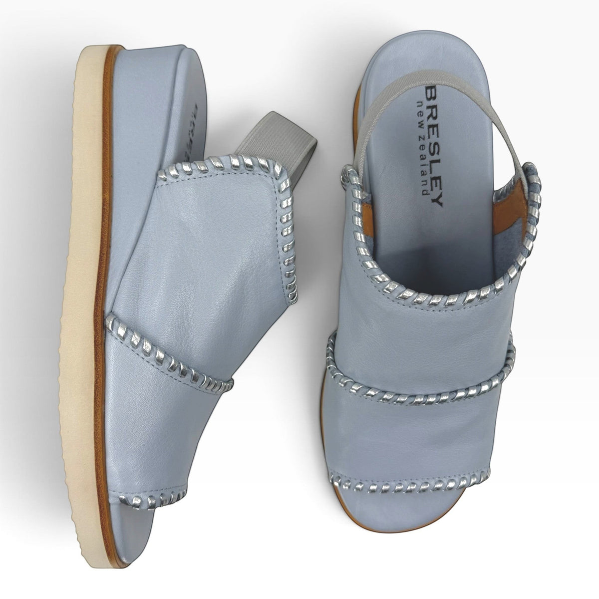 The Shoe Shop Sigma light blue leather wedge sandals with contrast silver whipstitch detail and elastic slingback