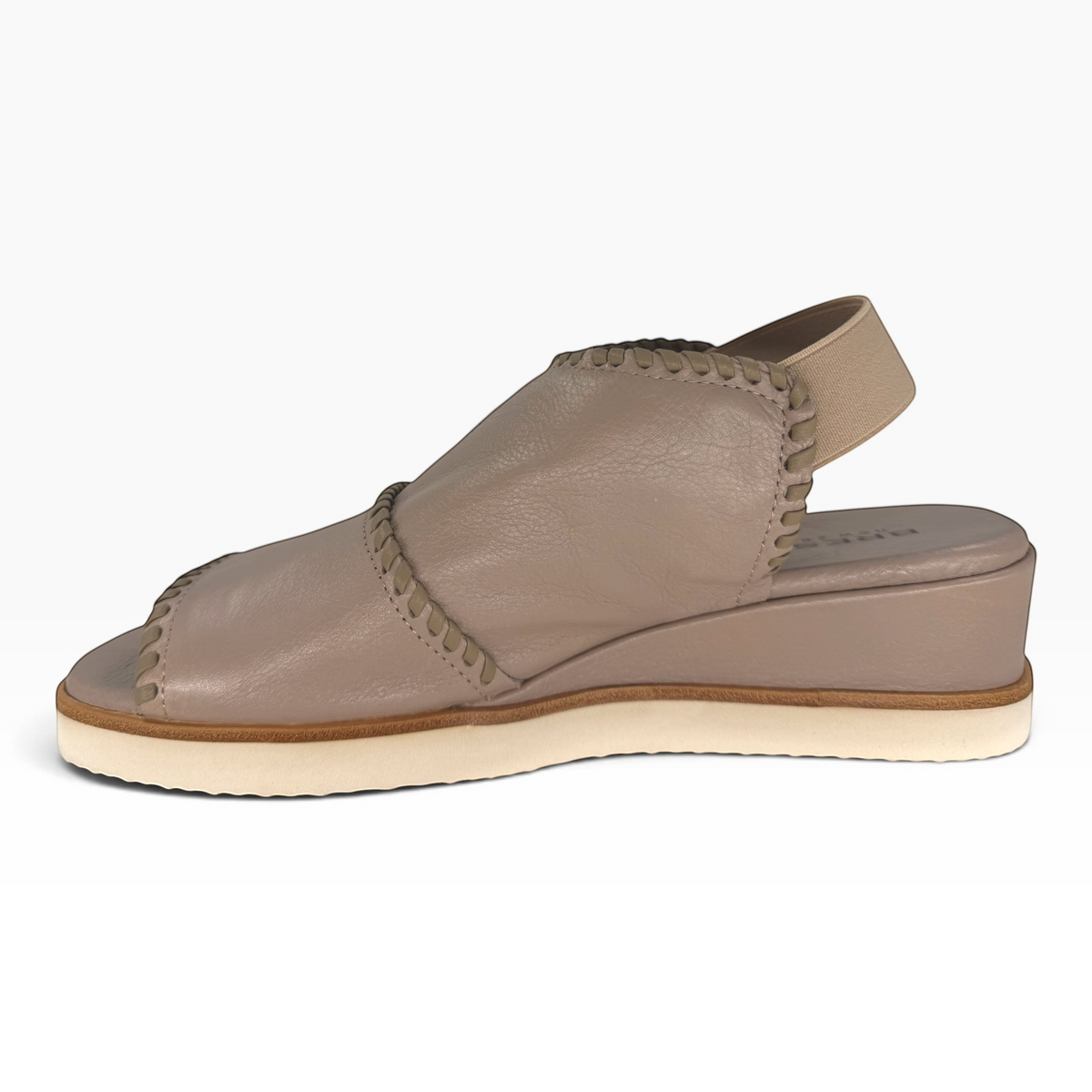 The Shoe Shop Sigma taupe leather wedge sandal with contrast whipstitch detailing and an elasticated slingback strap.