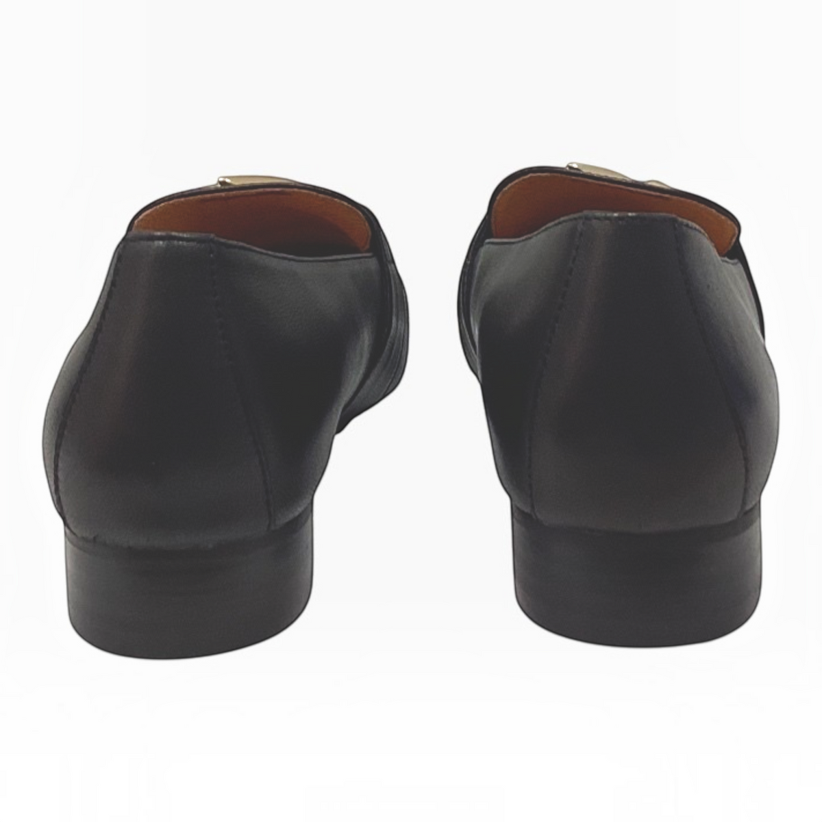 The Shoe Shop Sinamon black leather loafers featuring a low stacked heel, viewed from the back.