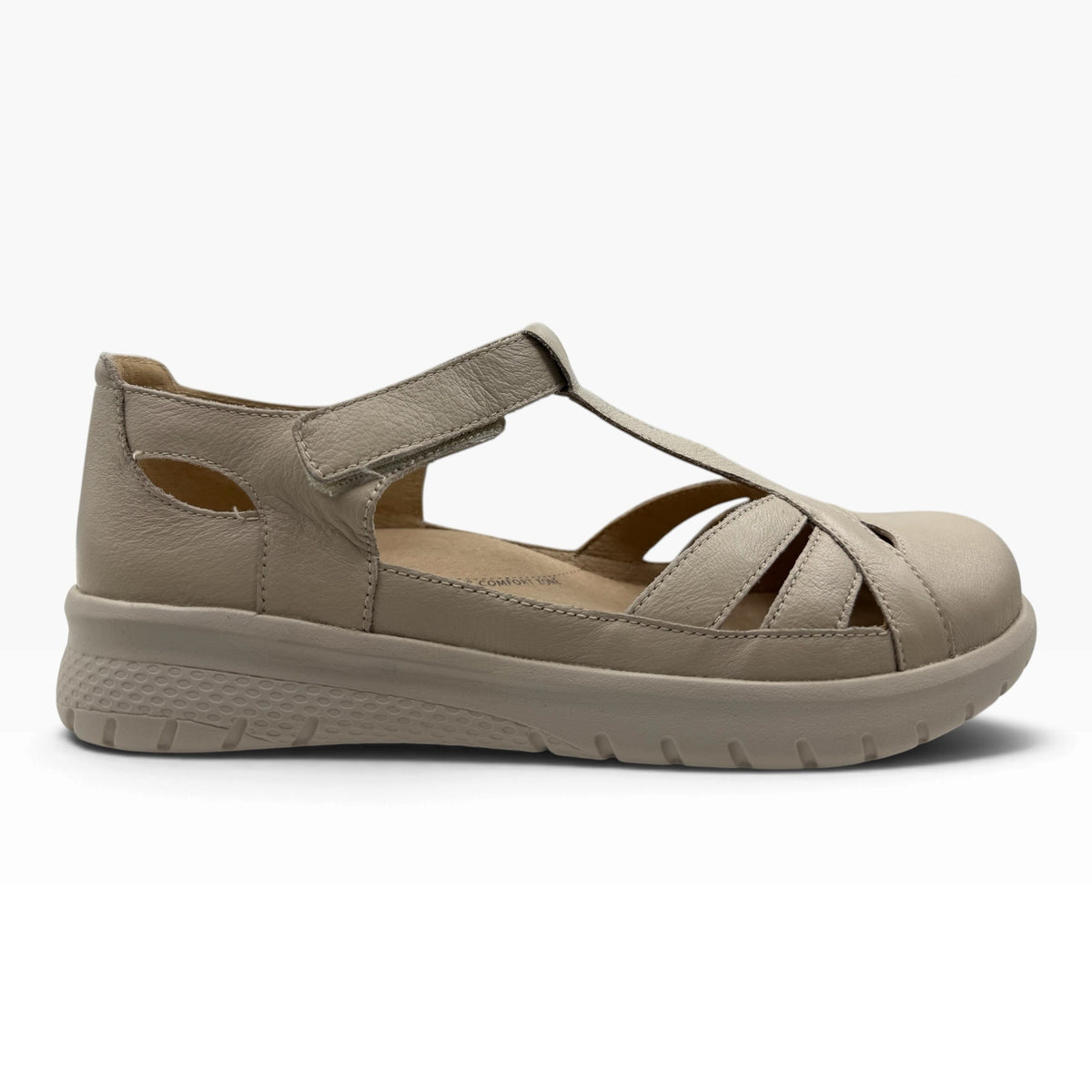 The Shoe Shop Sinsta beige leather sandal with adjustable strap, supportive footbed, and extra-wide fit.