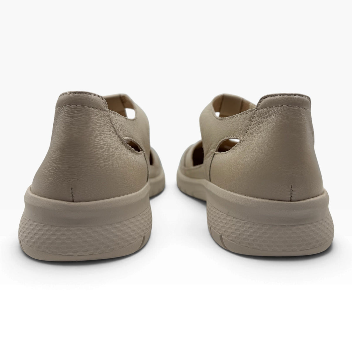 The Shoe Shop Sinsta beige leather sandals with a supportive heel and adjustable strap, back view.